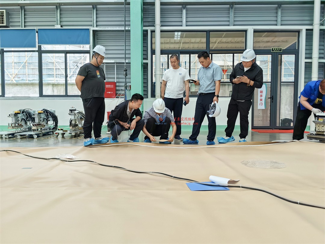 科技賦能品質(zhì)工程 | 萬豪集團攜手浙大團隊圓滿完成無錫奧體中心膜結(jié)構(gòu)排水試驗驗收